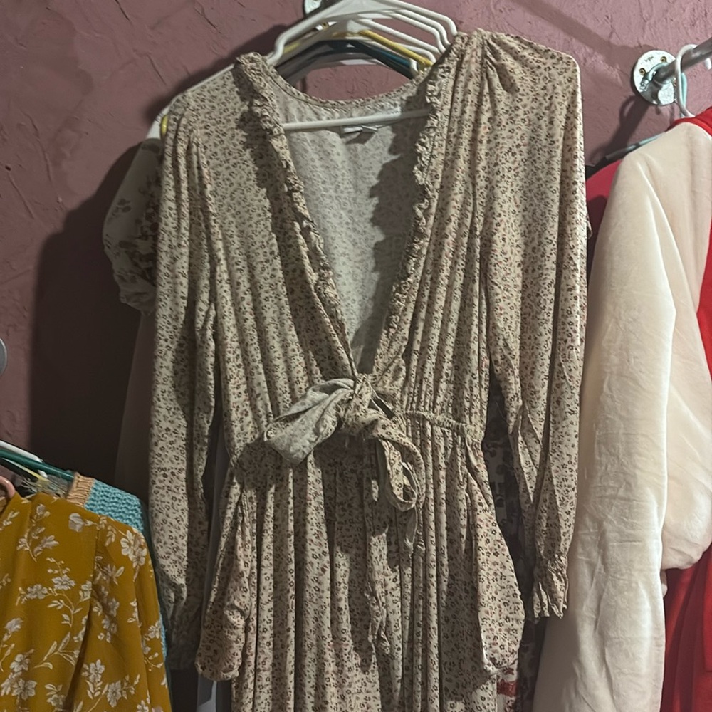 Long sleeve dress long in length.